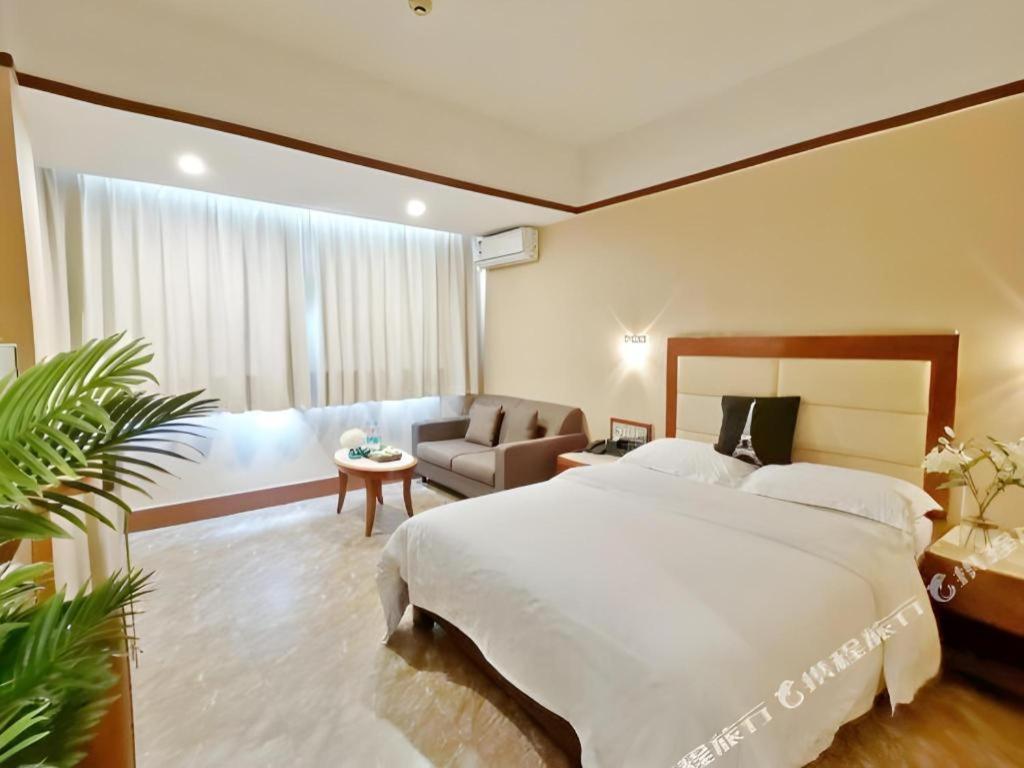 Wings Hotel Canton Esterno foto