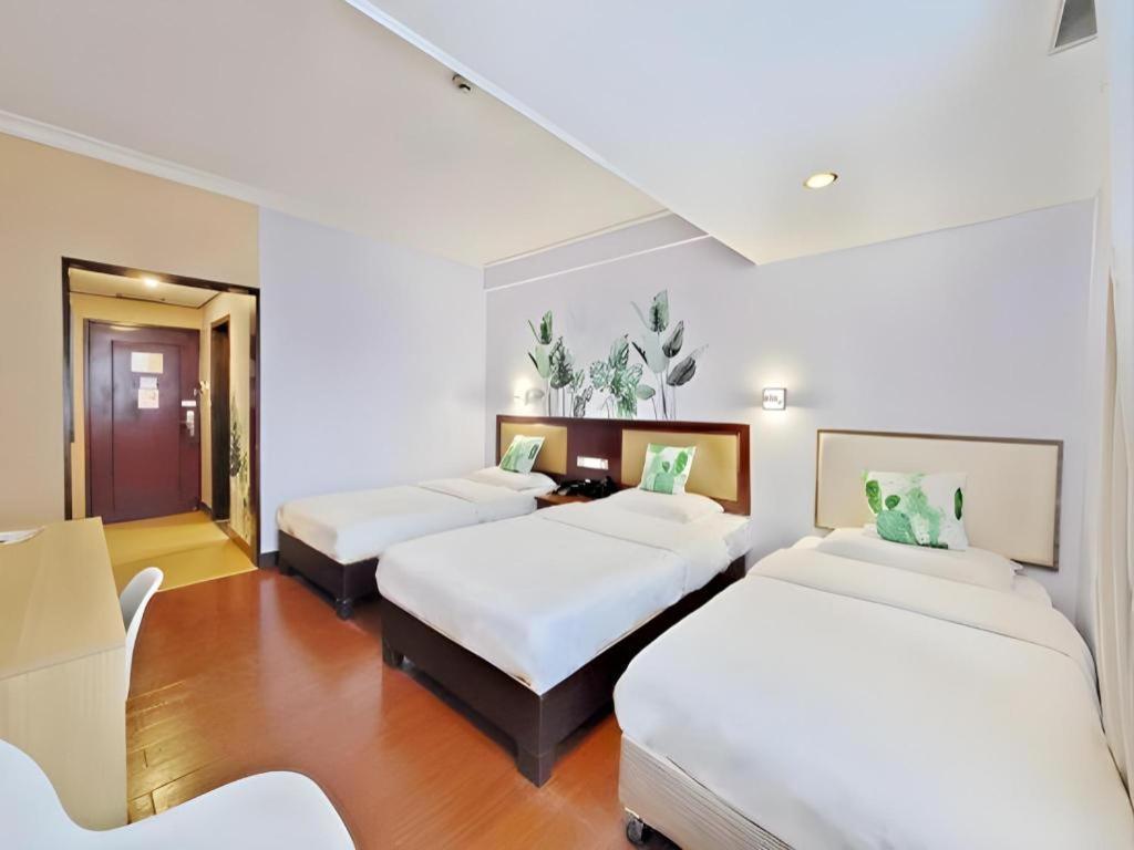 Wings Hotel Canton Esterno foto