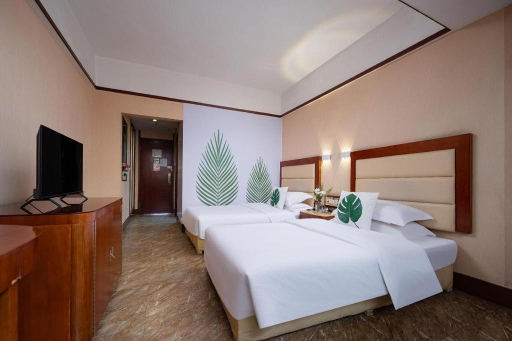 Wings Hotel Canton Esterno foto