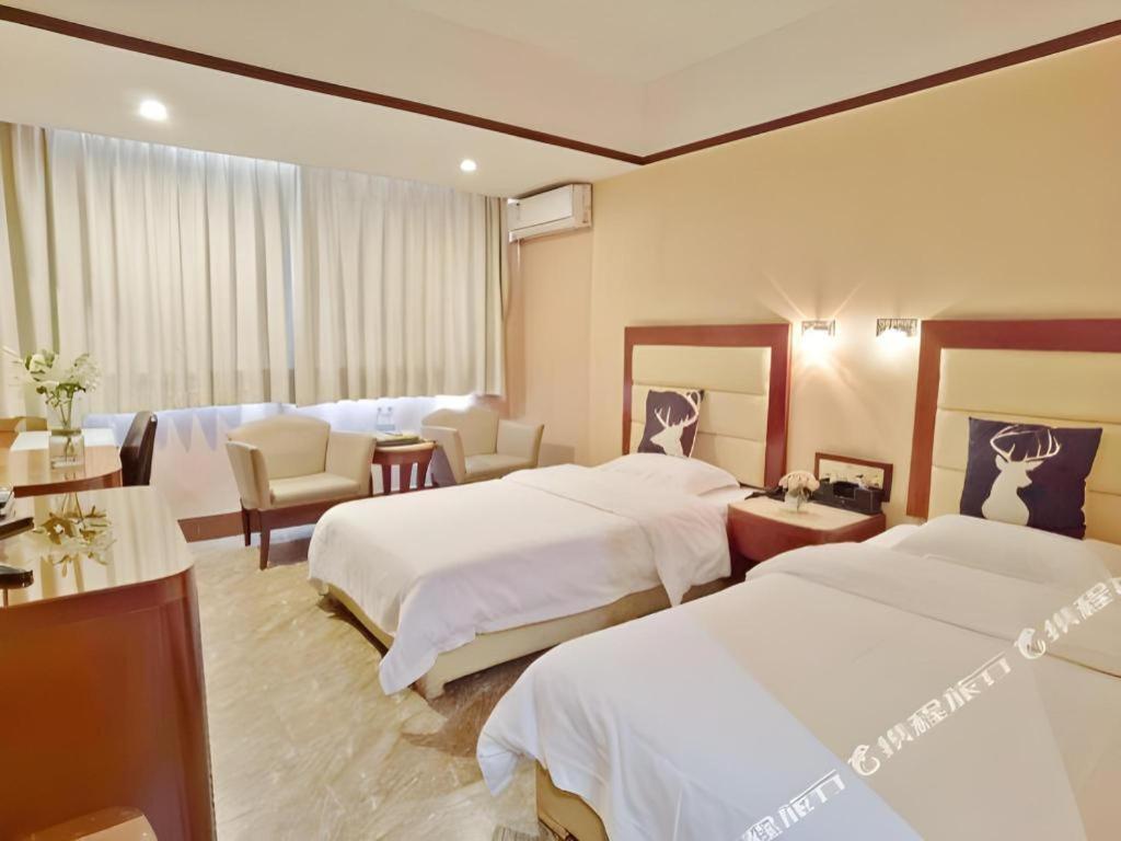 Wings Hotel Canton Esterno foto