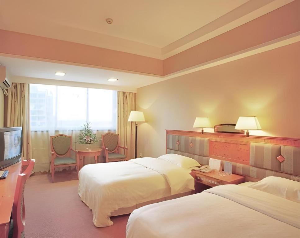 Wings Hotel Canton Esterno foto