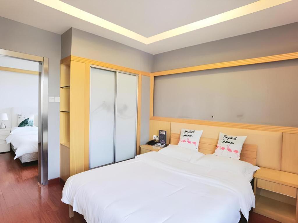 Wings Hotel Canton Esterno foto