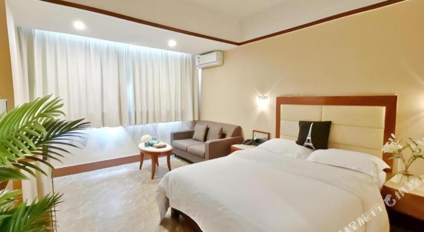 Wings Hotel Canton Esterno foto