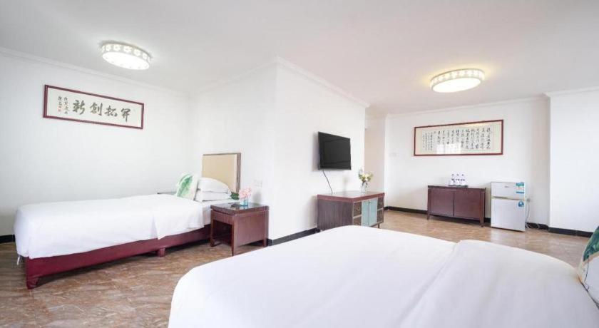 Wings Hotel Canton Esterno foto