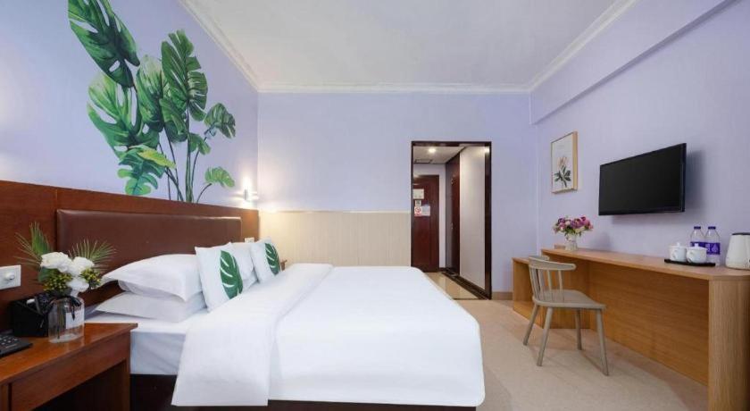 Wings Hotel Canton Esterno foto