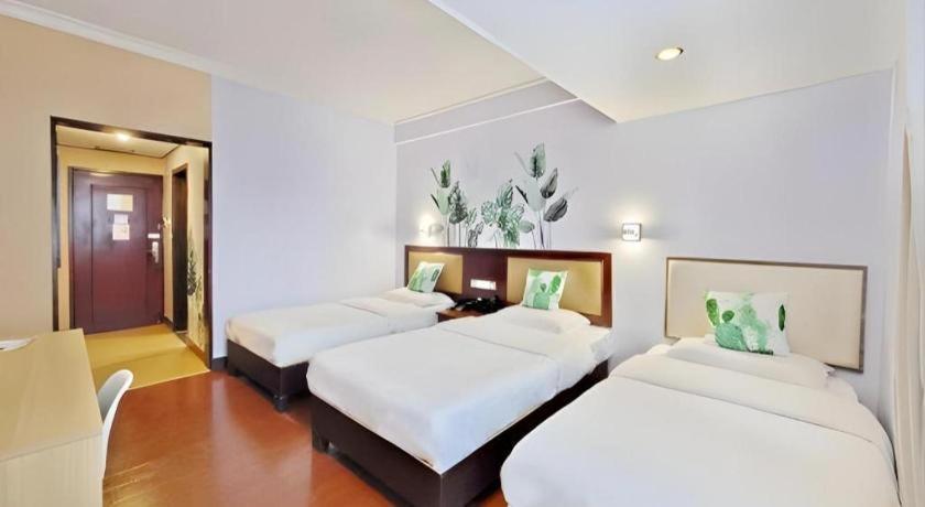 Wings Hotel Canton Esterno foto