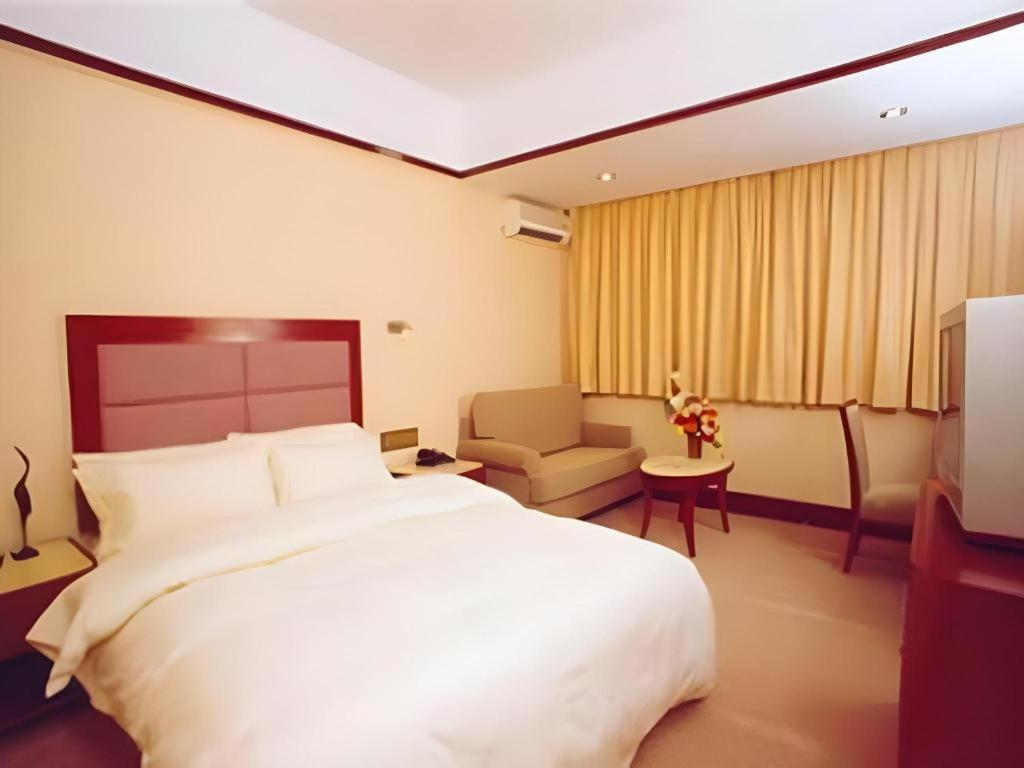 Wings Hotel Canton Esterno foto